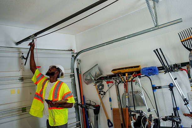 Professional Garage Door Roller Replacement technician working in Knoxville, IA